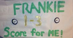 a white sign that says frankie 13 score for me with green writing on it