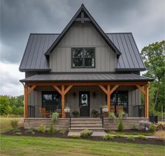 a house with a metal roof and porch