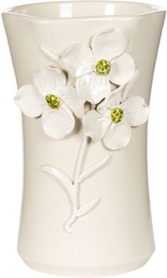 a white vase with flowers painted on it