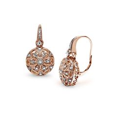 Round drop earrings present two small 1.3 diamonds set in a sterling silver filigree design. The earrings feature leverback closures. Product Details Metal Type rose-gold-flashed-silver Metal Stamp 925-sterling Weight 5.7GR Length 23.4MM Width 13.6MM Back Finding lever-back Stone Details Gem Type diamond Number of Stones 2 Stone Color J-K Stone Clarity I3 Stone Shape round-shape Total Weight 0.02 Setting Type prongs Stone Creation Method natural Stone Treatment Method Not-treated Princess Diamond Earrings, Heart Shaped Diamond Ring, Heart Shaped Engagement Rings, Link Jewelry, Diamond Earrings Design, Shiny Objects, Promise Rings For Her, Heart Shaped Diamond, Fancy Diamonds