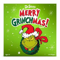 a green christmas card with an image of a grin on it's face and the words merry grinmas