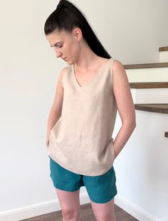 "Natural eco-friendly loose washed linen tank top for women's. Made with love for You. *100% local medium weight linen *Breathable tissue *Each item is individually cut and sewn by order *The model is wearing size M, top color - beige *The model is height is 168 cm *The length from shoulder to hem 65 cm *Note that colors may look different on your display depending on their settings and technical characteristics. Please let us know if you need different measurements or colors. CARE: *Machine was Casual Linen Vest Top, Casual Sleeveless Flax Tank Top, Sleeveless Linen Top For Everyday, Sleeveless Flax Tops For Spring, Everyday Sleeveless Linen Top, Spring Sleeveless Flax Tops, Flax Sleeveless Top For Spring, Spring Flax Sleeveless Top, Beige Sleeveless Linen Top