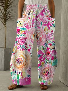 Flower Print Casual Pants Spring Multicolor Print Cotton Bottoms, Multicolor Printed Harem Pants For Summer, Summer Patterned Bottoms With Pockets, Patterned Summer Bottoms With Pockets, Spring Printed Long Harem Pants, Casual Multicolor Floral Print Pants, Multicolor Harem Pants For Spring Vacation, Casual Multicolor Print Bottoms With Elastic Waistband, Patterned Printed Bottoms For Spring