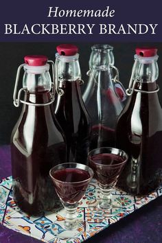 A tray with bottles and glasses filled with blackberry brandy Homemade Blackberry Liquor, Homemade Blackberry Brandy, Fruit Brandy Recipes, Blackberry Liquor Recipe, Blackberry Mead Recipe, Best Blackberry Recipes, Fruit Liquor Recipes, Homemade Brandy Recipes, Blackberry Brandy Recipe