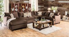 a living room filled with lots of furniture and wooden wall paneling on the walls