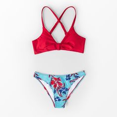 One of our best-selling swimsuits, now with more bust support! The red and floral print low waisted bikini has adjustable criss-cross back straps for the perfect fit and comfort. The bikini bottom is low rise with cheeky coverage.



DETAILS:

Type of article : Set of two pieces.
Fabric: 80% chinlon, 20% lycra.
Clothing care : Regular washing.
Pattern : Solid, Floral.
Style : Padded cups, adjustable strap.
Feature : High leg cut.

Decoration: Knot.
Fit: relaxed. Red Tropical Swimwear For Poolside, Red Swimwear For Surfing Beach Season, Red Swimwear For Surfing And Beach Season, Red Swimwear For Surfing During Beach Season, Red Floral Print Swimwear For Beach Party, Red Floral Print Swimwear For Pool, Red Floral Print Triangle Top Swimwear, Lace Beach Dress, Beach Stores