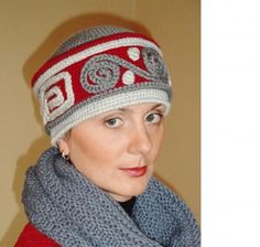 a woman wearing a knitted hat and scarf