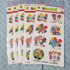 three sheets of stickers with children's pictures on them, each featuring different characters