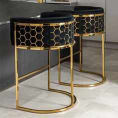 two black and gold tables in a kitchen