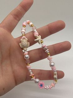 Bead Making Aesthetic, Pink Clay Bead Phone Charm, Clay Bead Bracelets With Charms, Summer Phone Charm Ideas, Cute Things To Write On Bracelets, Clay Bead Bracelet Aesthetic, Phone Charm Ideas Clay Beads, Play Bead Bracelet Ideas, Beaded Bracelet Color Combos