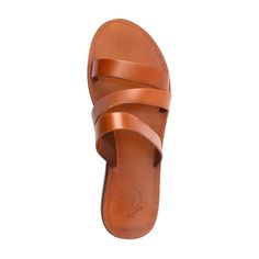 Leather Toe Loop Slides For Beach, Classic Leather Footbed Sandals For Beach, Leather Double Strap Footbed Sandals For Beach, Classic Toe Loop Sandals For The Beach, Leather Toe Loop Mules For Beach, Classic Single Toe Strap Footbed Sandals For Beach, Leather Footbed Sandals With Single Toe Strap For Beach, Leather Toe Loop Slides With Heel Loop, Leather Beach Slides With Heel Loop