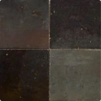 a black and grey tile floor with different colors