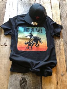 Ride Em Rank T-Shirt - Short Sleeve - Multi color graphic with Bucking Horse - Black - 100% Cotton Pre-Shrunk - Unisex Fit - Adult Sizing ***Hat Sold Separately Bucking Horse, Country Style Outfits, Western Life, Bull Skulls, Western Boho, Trading Company, Baseball Caps, After Dark, Rodeo