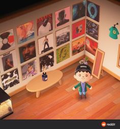 an animal crossing character standing in front of a living room with pictures on the wall