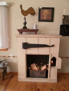 an old fireplace is decorated with candles