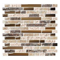 a mosaic tile wall with brown and white tiles on the bottom, in different colors