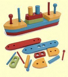 a wooden toy boat and parts to make it