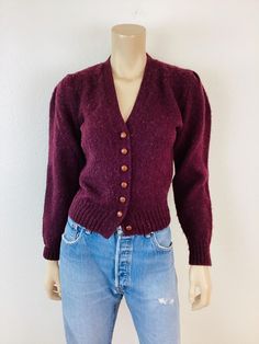 Vintage 1980s Ralph Lauren Sweater button front cardigan puff sleeve aubergine in color wool material great vintage condition appx size - S  18 pit-pit 22 length 23 sleeve all sales final Vintage Button Closure Sweater For Fall, Purple Buttoned Sweater For Fall, Purple Button Sweater For Fall, Vintage Button-up Sweater For Fall, Vintage Purple Cardigan For Winter, Purple Fall Cardigan With Button Closure, Purple Button-up Cardigan For Fall, Vintage Purple Sweater For Winter, Fitted Purple Cardigan With Buttons