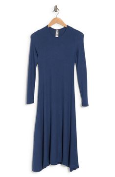 This long sleeve A-line dress is great for the office or dinner and makes for a classy, put-together look. Fit: this style runs small. 43" length (size Small) Crewneck
 Long sleeves A-line skirt 47% polyester, 47% rayon, 6% spandex Machine wash Made in the USA Model stats: 5'10", 32" bust, 25" waist, 36" hip. Model is wearing size Small. A Line Skirt, A Line Skirts, The Office, Nordstrom Rack, A Line Dress, A Line, Nordstrom, Long Sleeves, Spandex