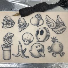 a bunch of different types of tattoos on a piece of paper