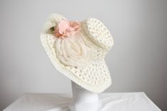 "Description and Measurements: Off white floppy sunhat with two big flowers on it. 5\" wide band, fits a 21-22\" head. Tag: No label Condition: Excellent Follow along on instagram @lovecharlesvintage" White Wide Brim Mini Hat For Vacation, White Wide Brim Mini Hats For Summer, Handmade White Hat For Kentucky Derby, Handmade White Wide Brim Sun Hat, Summer White Wide Brim Mini Hats, Handmade Flower Hats For Summer, White Bucket Hat For Kentucky Derby, Retro White Sun Hat For The Beach, White Brimmed Mini Hats For Vacation