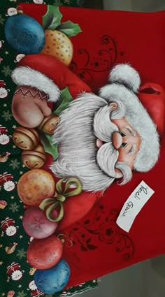 a painting of santa claus on a red background