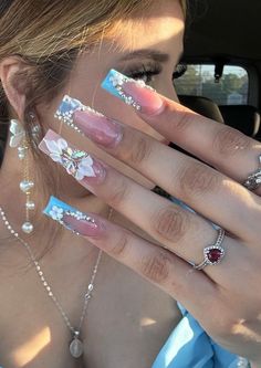 Extra Blinged Out Nails, Nail Tech Hand Poses, Boujie Nail Designs, Cute Xl Nails, Coral Blue Nails, Blue Bling Nails Rhinestones, Pink And Blue Ombre Nails, Blue And Pink Nails, Latina Nails