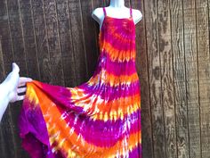 "Vintage tie dye dress. No tags - estimated size large. Please see measurements. Condition - has small seam separation in front near bottom - see last photo.  Measurements taken across front laid flat 19\" across front armpit to armpit 18\" across waist 26\" across hips 57\" total length" Bohemian Tie Dye Maxi Dress For Spring, Summer Festival Maxi Dress With Batik Print, Summer Festival Batik Print Maxi Dress, Hippie Style Multicolor Sundress For Festival, Multicolor Flowy Sundress For Festivals, Hippie Multicolor Sundress For Festival, Flowy Multicolor Sundress For Festival, Multicolor Hippie Sundress, Multicolor Hippie Sundress For Beach Season