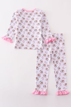 DESCRIPTION Get ready for the holidays with our Girl's Pink Christmas Santa Claus Pajama Set! Perfect for festive nights, the soft fabric will keep you comfortable while the fun print will make you the life of the party. A must-have addition to any sleepwear collection! Ho ho ho! Blending cotton with spandex in baby garments can offer several benefits: Stretch and Flexibility: Spandex, also known as elastane, is a highly elastic fiber. When blended with cotton, it imparts stretchiness and flexib Cute Printed Sleepwear For Pajama Party, Cute Printed Sleepwear For Sleepovers, Cute Printed Sets For Pajama Party, Cute Printed Sets For Sleepover, Playful Christmas Sleepwear, Playful Long Sleeve Sleepwear For Holidays, Cute Christmas Sleepwear For Pajama Party, Cute White Holiday Sleepwear, Cute Christmas Bedtime Sets