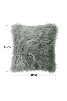 the grey furry pillow is shown with measurements