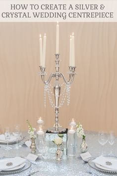 a silver and crystal wedding centerpiece with candles