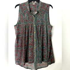 Brand New Without Tags! No Flaws Or Defects. Sheer Material, Gold Buttons, Short In The Front And Longer In The Back. Size: Large Trendy Flowy Sleeveless Blouse, Flowy Button-up Summer Tops, Multicolor Sleeveless Top With Buttons, Summer Patterned Blouse With Buttons, Summer Patterned Blouse With Button Closure, Bohemian Summer Top With Button Closure, Bohemian Green Tops With Buttons, Green Bohemian Blouse With Buttons, Bohemian Patterned Tops With Button Closure