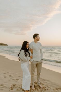 Lake Michigan Beach engagement photos, Michigan wedding photographer, sunset engagement photos on the beach, Lake Michigan photoshoot, West Michigan photographer, candid engagement photos, engagement photo poses, engagement photo inspiration, neutral casual engagement photo outfits Engagement Photos Lake, Michigan Engagement Photos, Pre Wedding Photoshoot Beach, Beach Photoshoot Ideas, Photoshoot At The Beach, Black Color Hairstyles