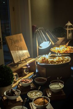 a buffet table filled with different types of food