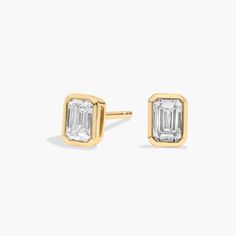 Beautifully matched, these diamond stud earrings feature emerald cut, near-colorless diamonds set in 14k yellow gold with bezel settings Pearl Bracelet Gold, Platinum Rose Gold, Gold Rings Fashion, Colorless Diamond, Gold Pearl Necklace, Ladies Diamond Rings, Diamond Stud Earrings, Engagement Ring Styles, Rose Gold Jewelry