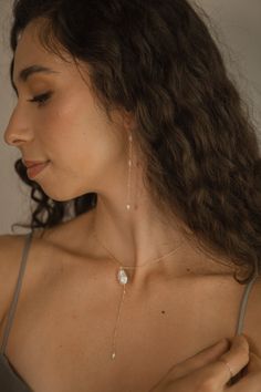 Inspired by the dreamy feeling of looking up into the clouds, the Cloud Collection reimagines historical jewelry elements resulting in timeless, airy, and whimsical jewelry that will have you floating on cloud nine. A freshwater pearl is not mined and shaped. It is born complete and lovely, beneath the water. Baroque pearls are especially "wabi sabi," beautiful in their asymmetry and each one of a kind. ﻿- 6mm freshwater pearls﻿- 18k Vermeil ﻿- About 3 1/2" long