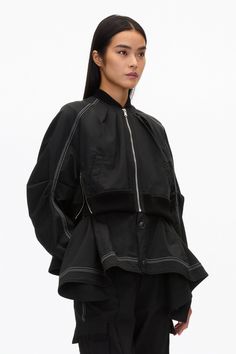 The bomber jacket is reimagined with feminine flair. Cut in an Italian viscose cotton blend, the underlayer drapes into an alluring handkerchief hem. Soft pleats around the neck line are gathered into contrast rib. Double closure, with zipper side details. Boxy fit. 60% Cotton 37% Viscose 3% Elastane Model is 5'10', Bu Black Layers, Perfect Pant, Handkerchief Hem, Long Sleeves Coats, 3.1 Phillip Lim, Women Trends, Short Jacket, Cotton Jacket, Phillip Lim