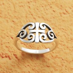 A timeless, Celtic design accents this sterling silver ring, adorned with a cross at its center, surrounded by a beautiful scroll pattern. #jamesavery Cross Rings, Heart And Cross, Celtic Crosses, Swimsuit Jewelry, James Avery Rings, Texas Jewelry, Love And Faith, James Avery Jewelry, Celtic Design