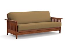 a wooden futon with a tan cover on it's back and armrests