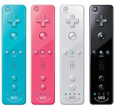 four different colored video game controllers lined up in a row with buttons on each side