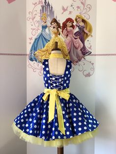 Gorgeous custom blue satin girls cocktail dress with white pea and yellow tulle dress. Blue polka dot dress with yellow gloves. Yellow belt and multi layered skirt. Headband with bow. Zipper and lacing back. Colors: blue, white, yellow. Size 5 (chest 24-24.5 waist 22-23 length 24-25) in stock. Size 6 (chest 25-26 waist 23-24 length 26) in stock. Can be made any size. Ready to ship . Fitted Yellow Princess Dress For Fancy Dress, Fitted Yellow Dress For Birthday, Polka Dot Princess Dress For Party, Princess Style Polka Dot Party Dress, Fitted Polka Dot Dress For Costume Party, Tulle Dress Blue, Yellow Tulle Dress, Fuchsia Outfit, Hot Pink Cocktails