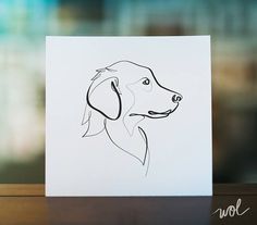 a card with a drawing of a dog's face