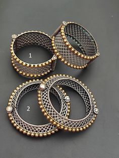 This Listing is for 2 Pcs  Flower & Elephant Theme Oxidized Dual Tone Bangle Bracelet Openable Kada Purely Handcrafted Traditional Style Vintage Look Boho Statement Bangle For Women & Girl 1 - Inner diameter :   2.3" Approx. Bangle Width Size: 28 mm    2 - Inner diameter :   2.3" Approx. Bangle Width Size:  16 mm  Light weight comfortable to wear Metal Bangle Bracelet With Intricate Design, Adjustable Metal Bangle With Intricate Design, Adjustable Bracelets With Intricate Design, Adjustable Metal Bracelets With Intricate Design, Handcrafted Silver Bangle, Handmade Metal Beaded Bangle Bracelets, Handmade Metal Bangle Beaded Bracelets, Handmade Metal Beaded Bangle Bracelet, Handmade Metal Bracelets For Wedding