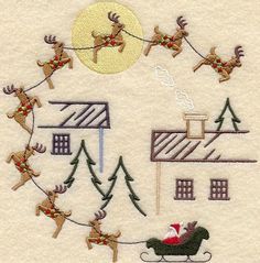 an embroidered christmas scene with santa and his sleigh