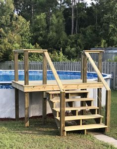 an above ground pool with steps leading up to it