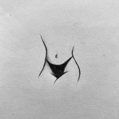 a black and white photo of a woman's stomach