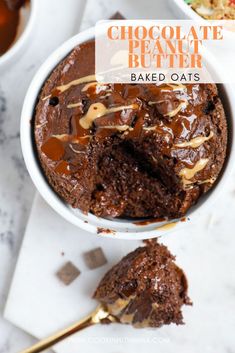 chocolate peanut butter baked oats in a bowl with a bite taken out of it