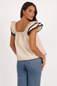 DETAILS   Picture yourself in this top, whether you're attending a casual brunch with friends or a laid-back evening stroll. Its design is thoughtfully crafted to cater to your everyday fashion needs, making it an easy choice for any occasion.    smock style top  straight elasticised neckline  short sleeves  front pleat detail  ric rac trim sleeve and hem feature  lined - 100% polyester  m aterial - 100% cotton     SIZING    model is 5' 8" and wears a Size S  model stats: bust - 33", waist - 26" Fitted Beige Smocked Top With Ruffles, Black Going Out Tops, Spring Peasant Top With Smocked Cuffs And V-neck, Casual V-neck Peasant Top With Smocked Cuffs, Feminine V-neck Smocked Top With Ruffles, Wedding Swimwear, Summer Embroidered V-neck Top With Ruffles, Church Dresses, Church Outfits