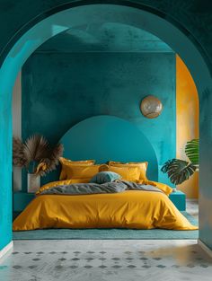 a bed with yellow sheets and pillows in a blue walled room that looks like an arch