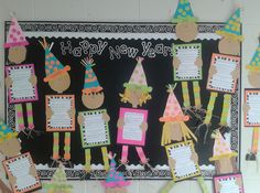 a bulletin board decorated with new year's hats